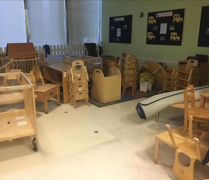 Water damage in local school. Items are cornered off to avoid further damage. 