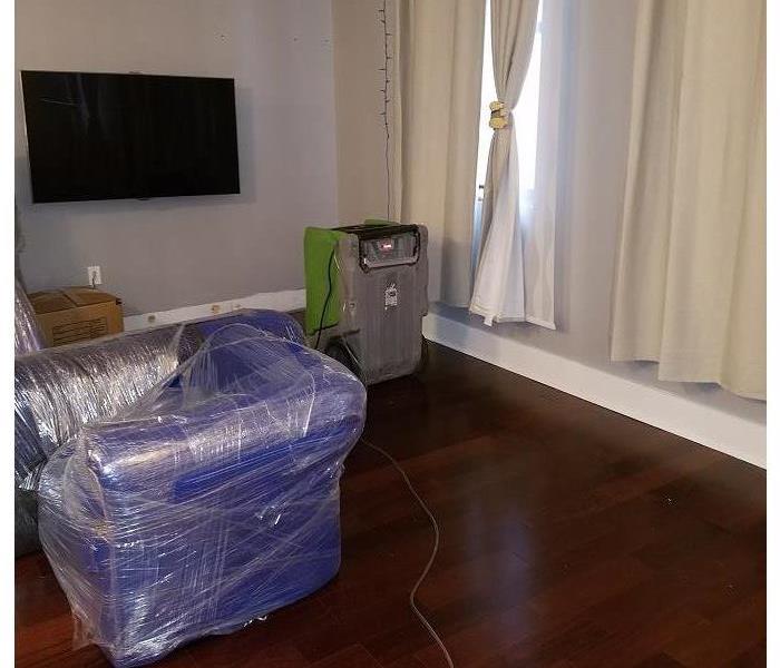 The same room with the floors put back and the items wrapped. 